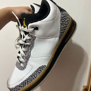 Jordan White and Black Sneakers with Gold Highlights